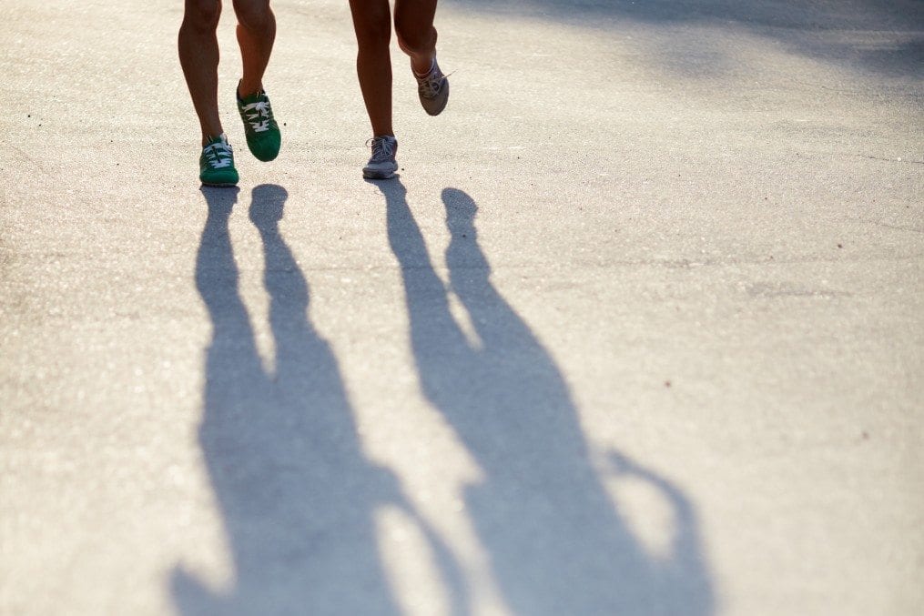 two people running