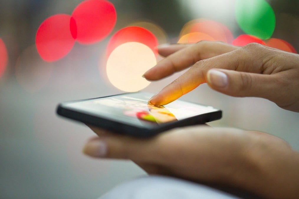 hands using smartphone