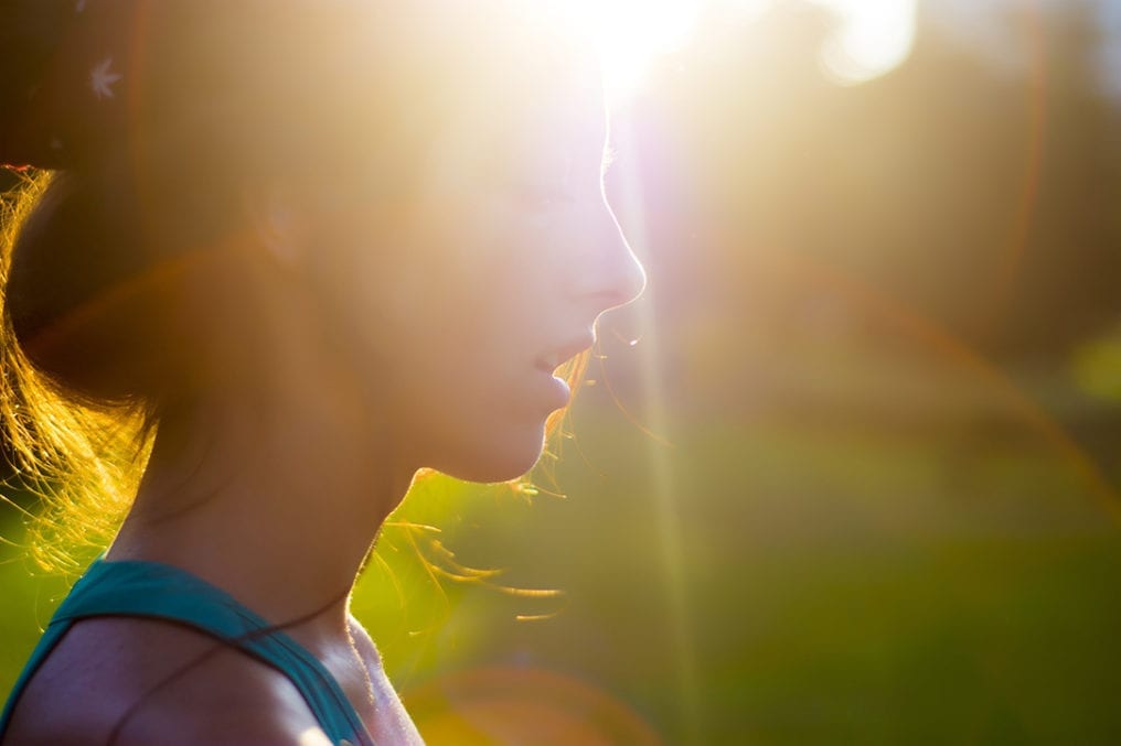 young woman in the sun