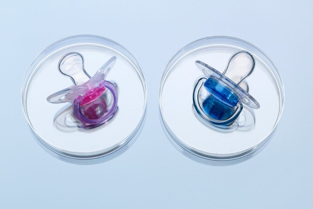 Pink and blue baby dummies/pacifiers