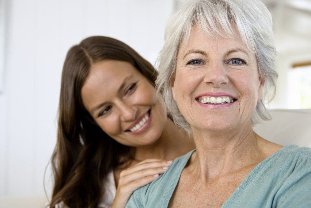 Portrait of smiling mother and daughter