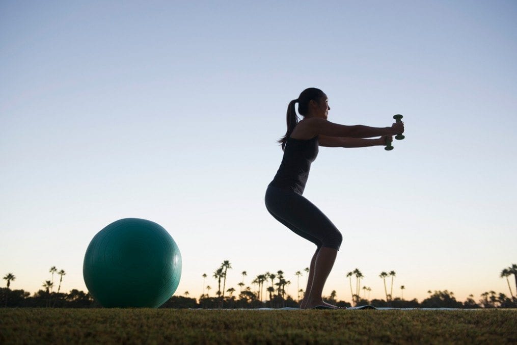 woman working out on her thighs