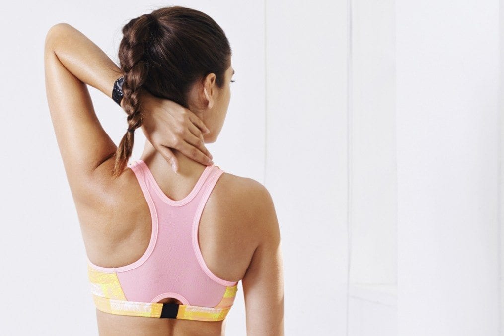 woman with left upper arm raised