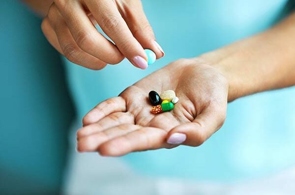 Supplements on a palm
