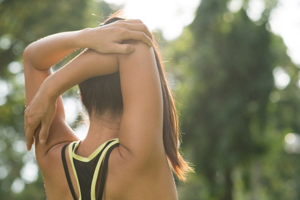 woman stretching before work out
