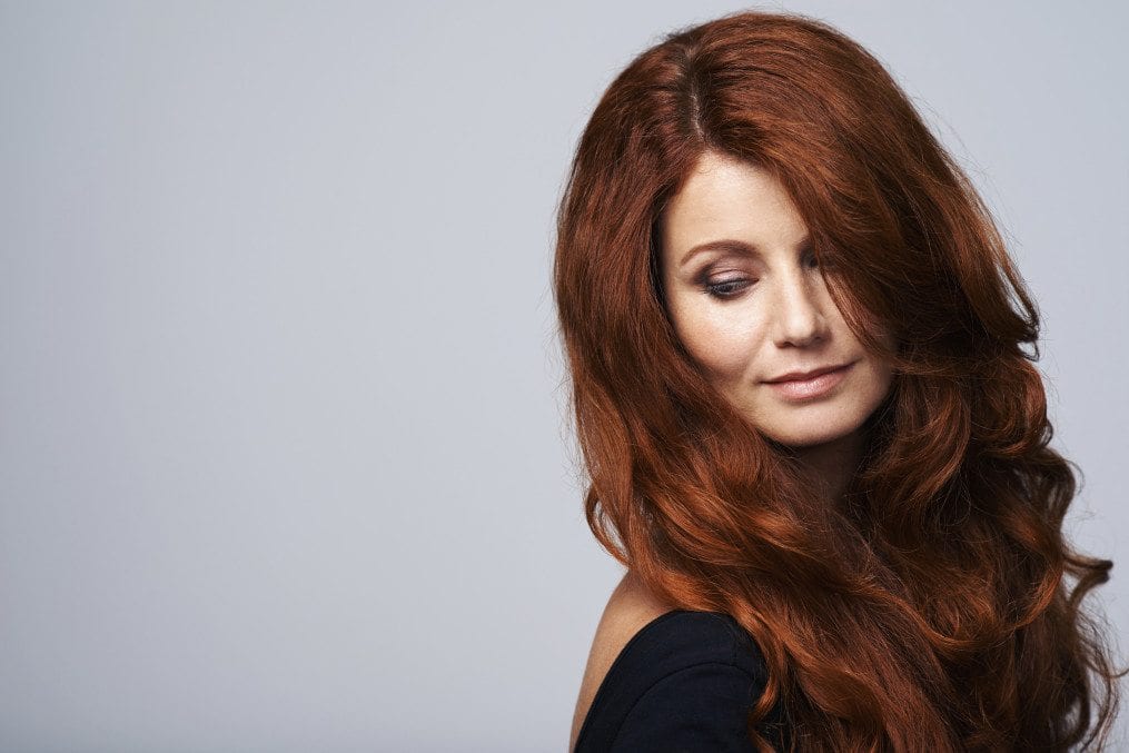 Woman with gorgeous full red hair