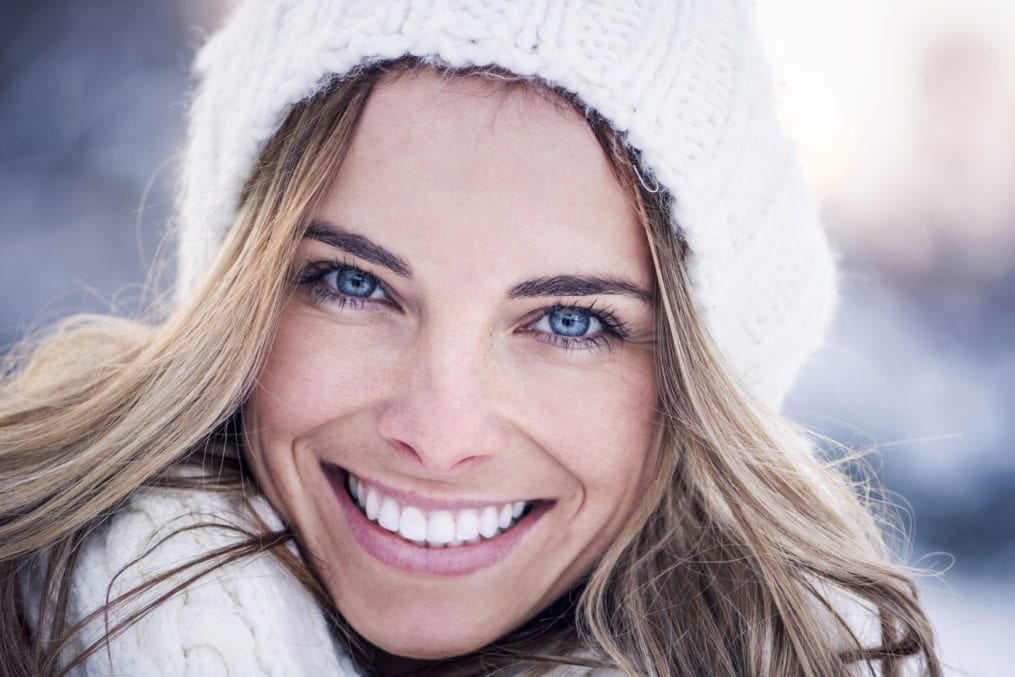 Woman smiling showing very white teeth