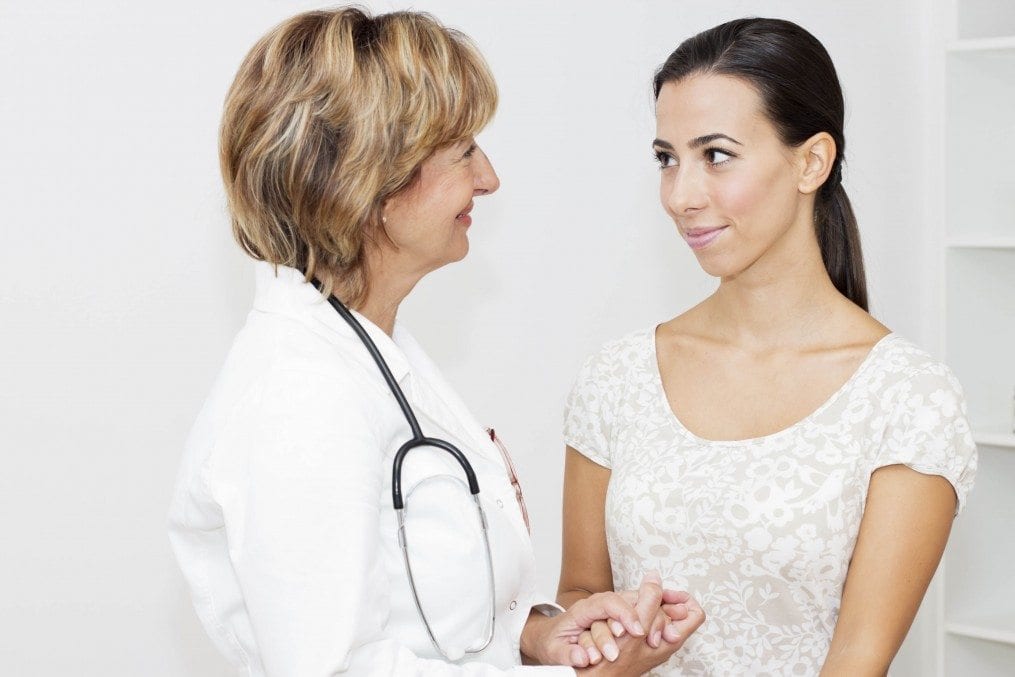 Doctor with cancer patient